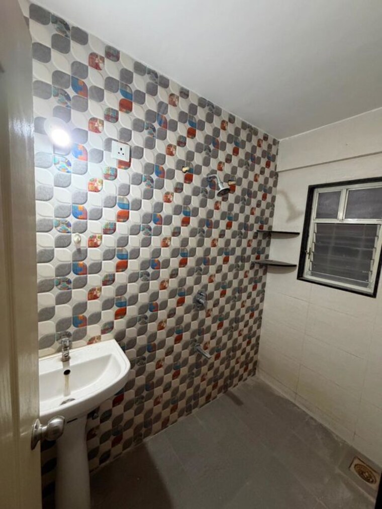 Bathroom, united-arise 2 Bedroom 850 Sq.Ft. Apartment In Lohgaon Pune 10296392