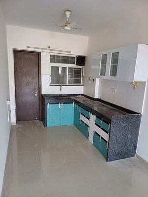Kitchen in 2 BHK Apartment at Mantra Insignia, Mundhwa – for Rent