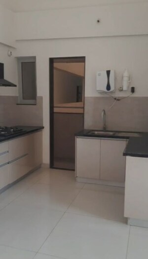 Kitchen in 2 BHK Apartment at Gera Planet Of Joy, Kharadi – for Sale