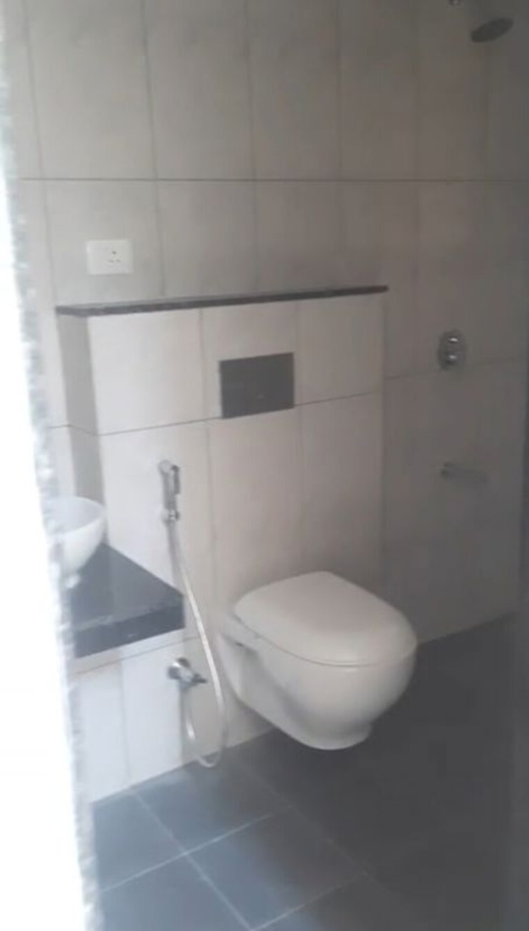 Bathroom, gera-planet-of-joy 2 Bedroom 773 Sq.Ft. Apartment In Kharadi Pune 10296474