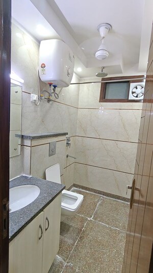 Bathroom in 2 BHK Builder Floor at Malviya Nagar – for Rent