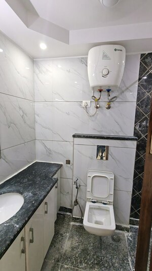 Bathroom in 2 BHK Builder Floor at Malviya Nagar – for Rent