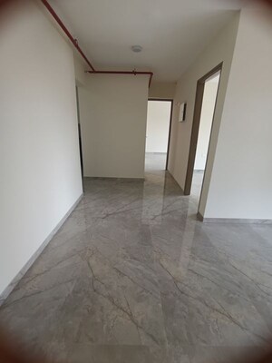 Living Room in 2 BHK Apartment at Ajmera Boulevard, Malad West – for Rent