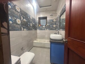 Bathroom in 3 BHK Builder Floor at Panchsheel Enclave – for Rent