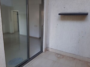 Room in 2 BHK Apartment at Gulmohar Goldcoast, Kharadi – for Rent