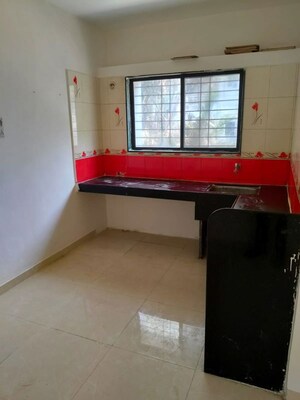 Kitchen in 2 BHK Apartment at Vastushree Enclave, Dhanori – for Rent