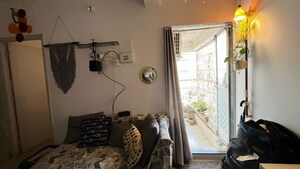 Living Room in 1 BHK Apartment at Oshiwara Mhada, Andheri West – for Rent
