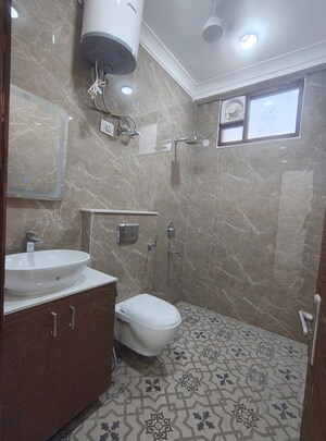 Bathroom in 3 BHK Builder Floor at Malviya Nagar – for Sale