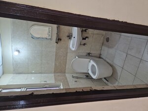 Bathroom in 2 BHK Apartment at Amrapali Princely Estate, Sector 76 – for Rent