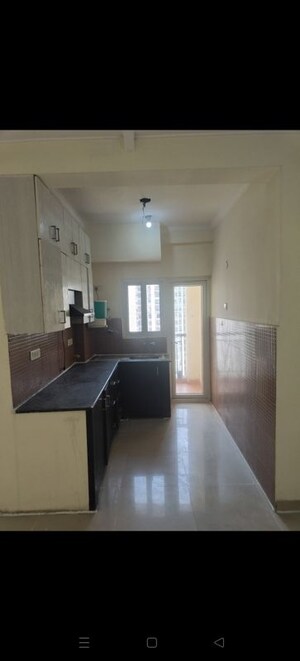 Kitchen in 2.5 BHK Apartment at Antriksh Golf View, Sector 78 – for Rent