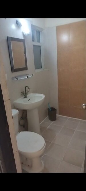 Bathroom in 2.5 BHK Apartment at Antriksh Golf View, Sector 78 – for Rent