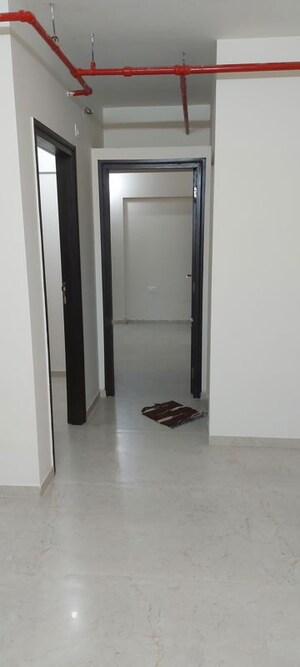 Building Lobby in 2 BHK Apartment at Dosti West County, Balkum Pada – for Rent