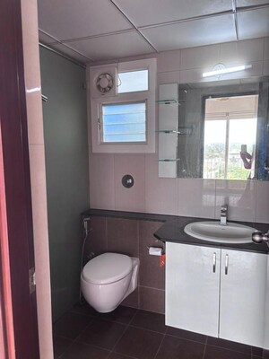 Bathroom in 2 BHK Apartment at Puravankara Palm Beach, Hennur – for Sale