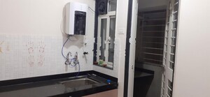 Kitchen in 3 BHK Apartment at Basil Mondale, Mundhwa – for Rent