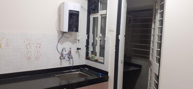 Kitchen, basil-mondale 3 Bedroom 1300 Sq.Ft. Apartment In Mundhwa Pune 10297200