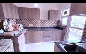 Kitchen in 3.5 BHK Apartment at Adani M2K Oyster Grande, Sector 102 – for Rent
