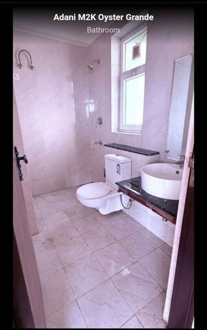 Bathroom in 3.5 BHK Apartment at Adani M2K Oyster Grande, Sector 102 – for Rent