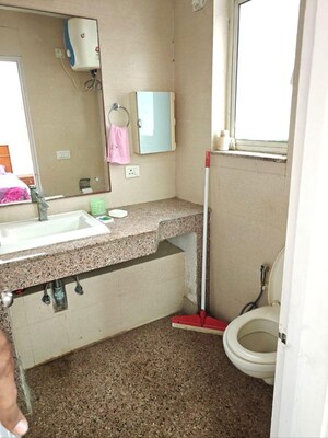 Bathroom in 2 BHK Apartment at Raheja Vedaanta, Sector 108 – for Rent