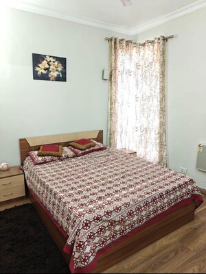Bedroom in 2 BHK Apartment at Raheja Vedaanta, Sector 108 – for Rent