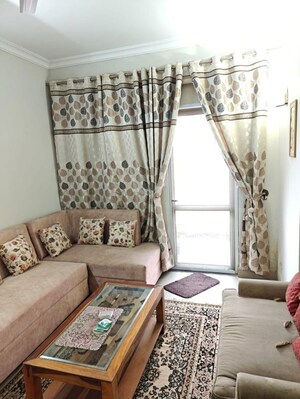 Living Room in 2 BHK Apartment at Raheja Vedaanta, Sector 108 – for Rent