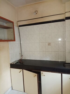 Kitchen in 1 BHK Apartment at Mantri Serene, Goregaon East – for Rent
