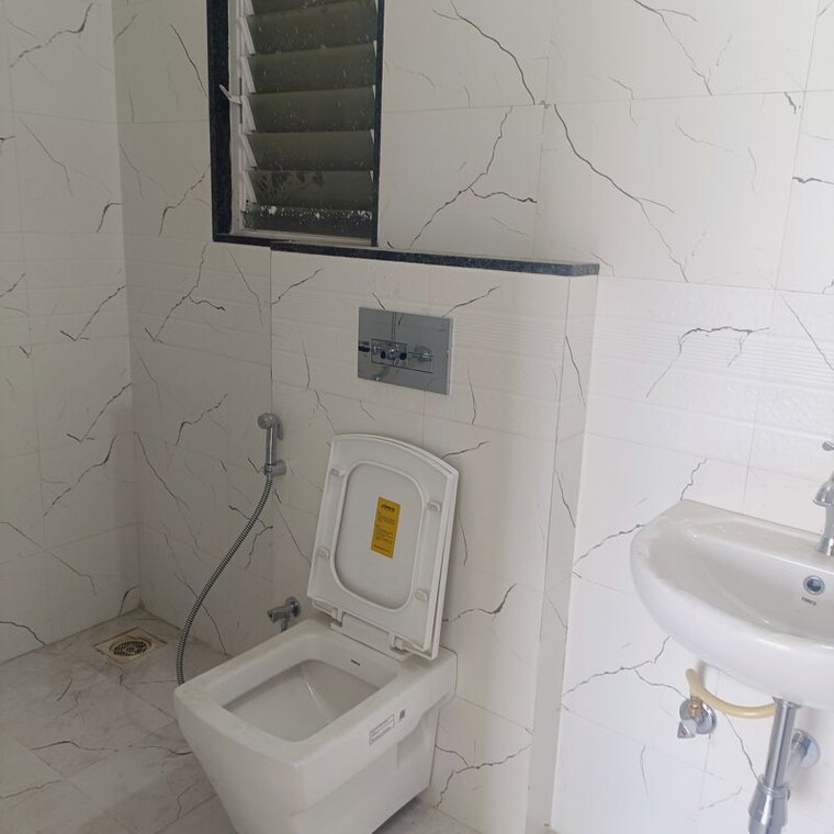 Bathroom, magarpatta-city-cosmos 2 Bedroom 1100 Sq.Ft. Apartment In Magarpatta Road Pune 10297335