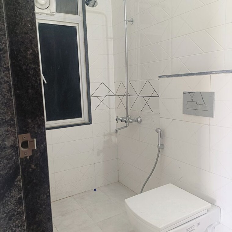 Bathroom, magarpatta-city-cosmos 2 Bedroom 1100 Sq.Ft. Apartment In Magarpatta Road Pune 10297335