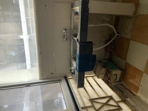 Kitchen in 2 BHK Apartment at Maya Garden City, Lohgarh – for Sale