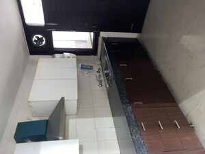 Kitchen in 2 BHK Apartment at Maya Garden City, Lohgarh – for Sale