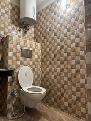 Bathroom in 3.5 BHK Apartment at Ansal Celebrity Meadows, Sushant Golf City – for Rent