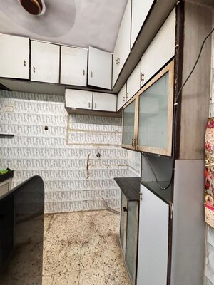 Kitchen in 1 BHK Apartment at Rawalpada – for Rent