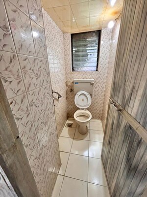 Bathroom in 1 BHK Apartment at Rawalpada – for Rent