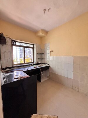 Kitchen in 1 BHK Apartment at Rawalpada – for Rent