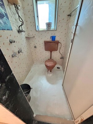 Bathroom in 1 BHK Apartment at Rawalpada – for Rent