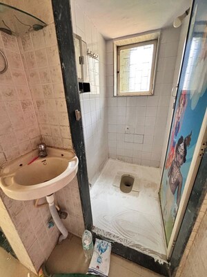 Bathroom in 1 BHK Apartment at Rawalpada – for Rent