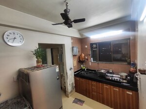 Living Room in 1 BHK Apartment at Swapnapurti CHS Kharghar, Kharghar – for Sale