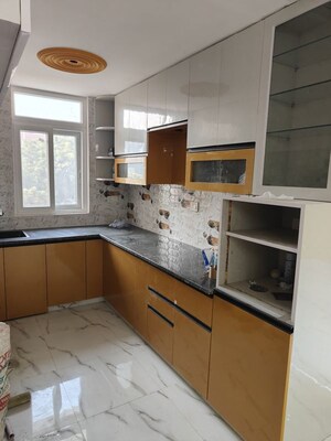 Kitchen in 3 BHK Apartment at Arun Vihar Sector 37, Sector 37 – for Sale