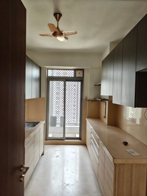 Kitchen in 3 BHK Apartment at Piramal  Vaikunth Cluster 4, Balkum Pada – for Rent