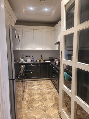 Kitchen in 3 BHK Builder Floor at Sushant Lok I – for Sale