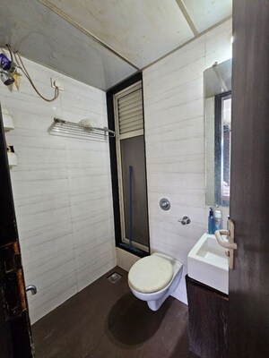 Bathroom in 2 BHK Apartment at Yash Satyaneelayam CHS, Naupada – for Rent