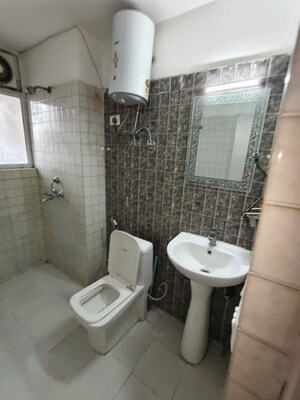 Bathroom in 3 BHK Apartment at Nirala Greenshire, Sector 2 Greater Noida – for Rent