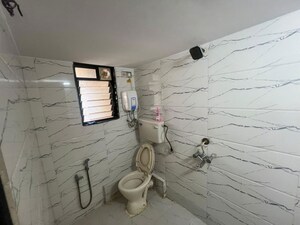 Bathroom in 2 BHK Apartment at Jheel Darshan Apartment, Powai – for Rent
