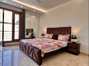 Bedroom in 4 BHK Builder Floor at South Extension ii – for Rent
