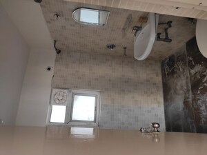 Bathroom in 2 BHK Apartment at Orris Carnation Residency, Sector 85 – for Rent