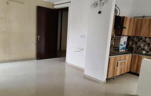 Living Room in 2 BHK Apartment at UPAVP Ganga Yamuna And Hindon Enclave, Pratap Vihar – for Sale
