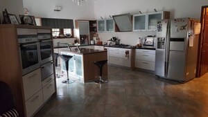 Kitchen in 4 BHK Villa at Hollywood Town, International Airport Road – for Sale