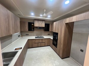 Kitchen in 3.5 BHK Builder Floor at Panchsheel Enclave – for Sale