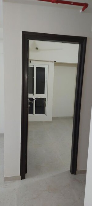 Building Lobby in 2 BHK Apartment at Dosti West County, Balkum Pada – for Rent