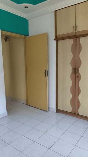 Room in 1 BHK Apartment at Kalpavriksha Garden Co.op.Hsg.Soc.Ltd., Dhokali – for Rent