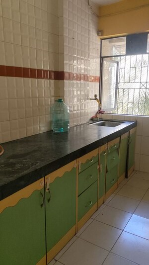 Kitchen in 1 BHK Apartment at Kalpavriksha Garden Co.op.Hsg.Soc.Ltd., Dhokali – for Rent
